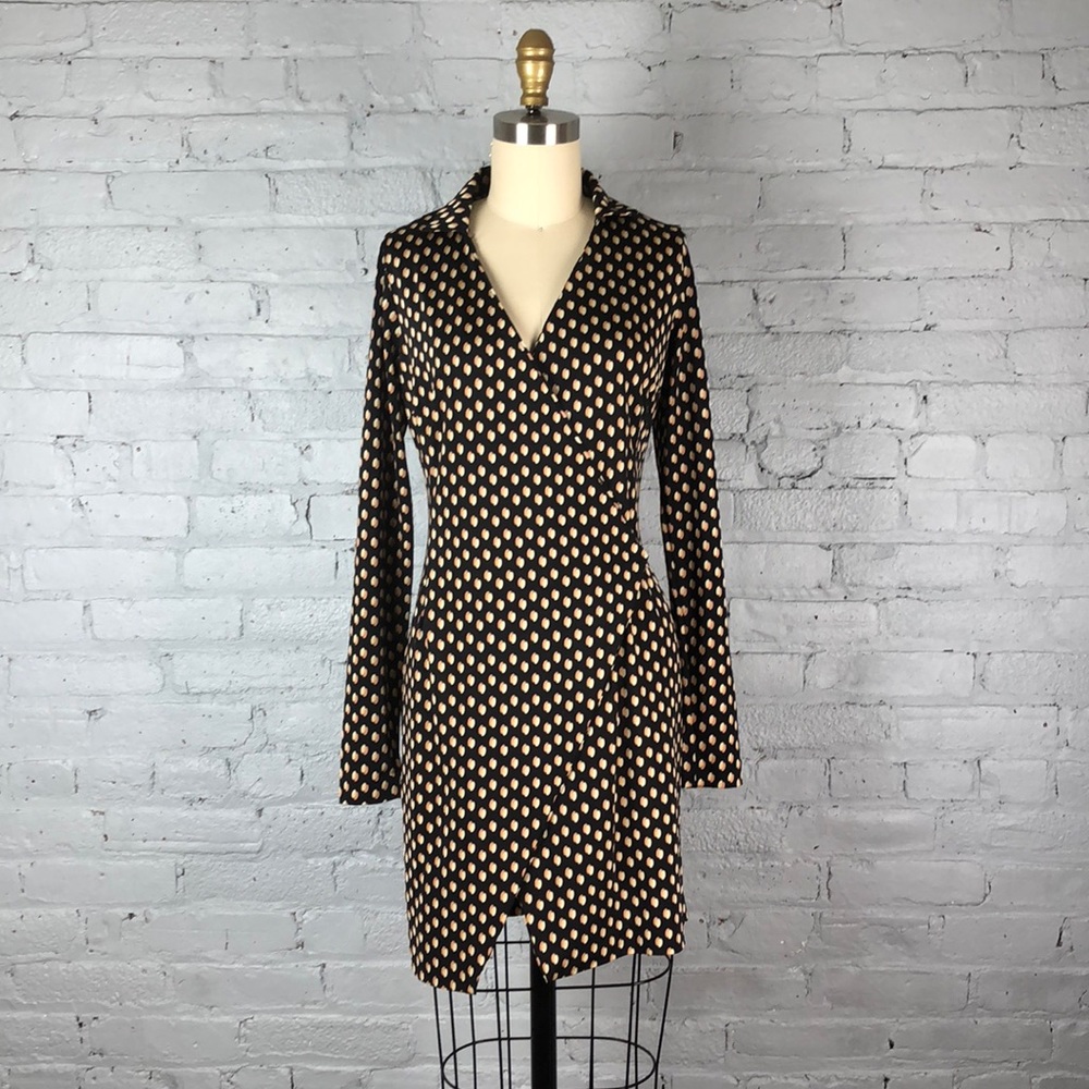 Black printed mini wrap dress by adele fado